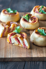 Pizza rolls on the wooden board