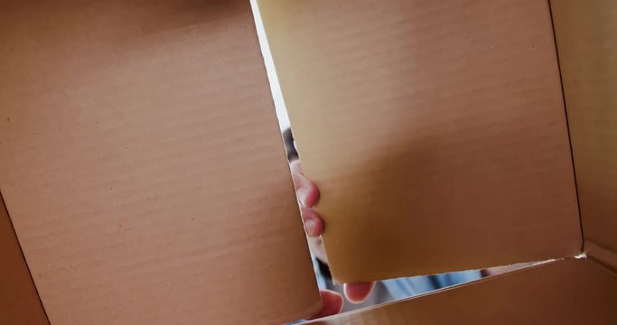 man open the box