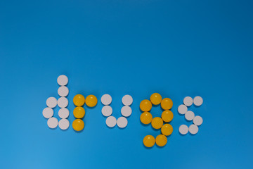 pills on the blue background