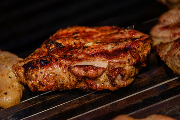 cook shish kebab on the grill in the open air