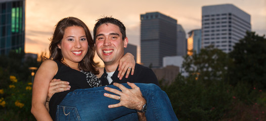 Young couple outdoor portrait in a downtown urban park
