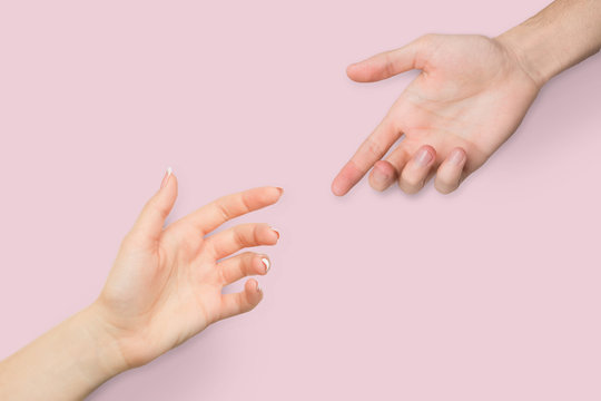 Male and female hands before touching