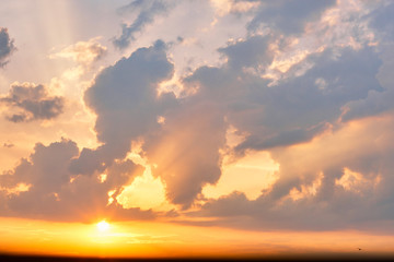 Obraz na płótnie Canvas Sunset sky clouds, light rays and other atmospheric effect