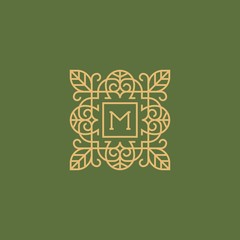 Golden sign monogram in line style on a green background.