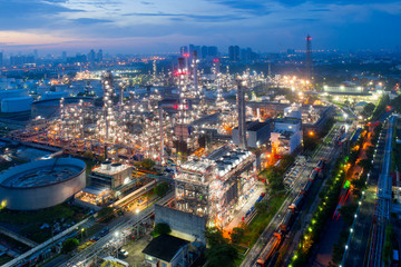 Aerial view of twilight of oil refinery ,Shot from drone of Oil refinery and Petrochemical plant at...