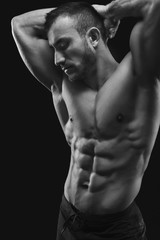 Fototapeta premium Strong athletic man showes naked muscular body