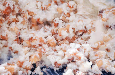 Close up on a lard with pork scratchings for frying or spreading on a bread