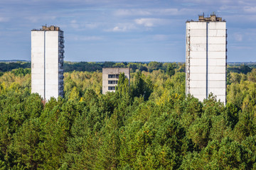 Obraz premium Blocks of houses in Pripyat ghost town of Chernobyl Exclusion Zone, Ukraine