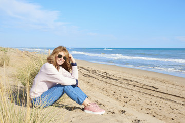 Woman relaxing at the beach