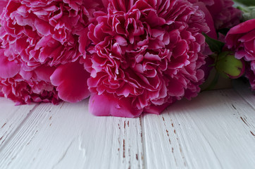  beautiful spring pink peonies on white vintage wooden table beautiful spring pink peonies on white vintage wooden table