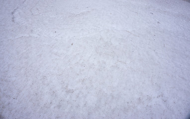 Surface of ground covered with snow in winter