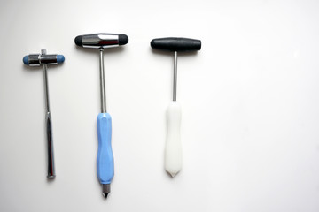 different reflex hammers on white background