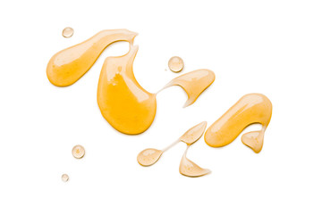 Liquid honey isolated on white background