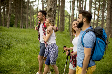 Group of young people are hiking in mountain