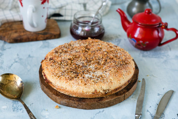 Composition of homemade pie with tea on white background