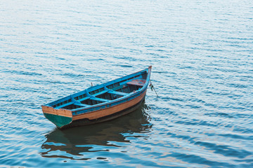 View of a moroccan small boat floating on a river
