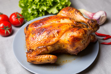 Chicken baked whole. Selective focus, close-up.
