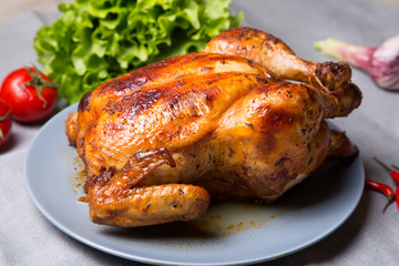 Chicken baked whole. Selective focus, close-up.