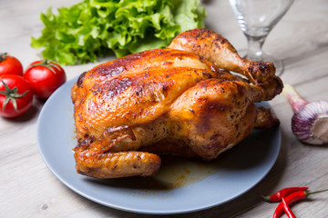Chicken baked whole. Selective focus, close-up.