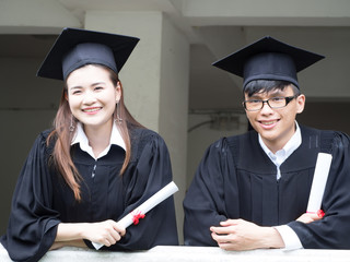 Graduation Friend Celebrate Degree Concept.Beautiful Asian university graduates celebrate their success.