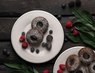 donuts, two, berries, icing sugar, dark wooden backdrop, 