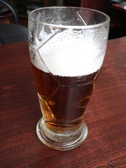 a glass of beer on the table
