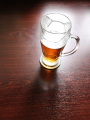 a glass of beer on the table