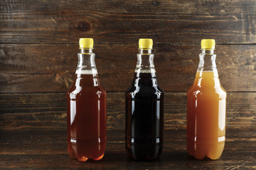 different beer on a wooden background