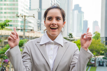 Young businesswoman look good on the outside background.