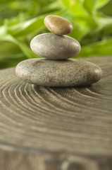 Fototapeta na wymiar Zen Stones over natural wooden rings
