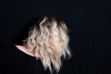 Rooty Blonde Mid Length Hairstyle