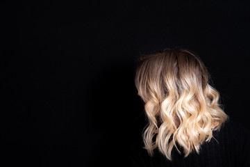 Rooty Blonde Mid Length Hairstyle
