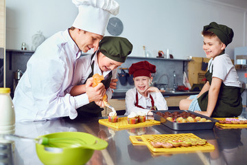 Children learn to cook in the classroom in the kitchen.