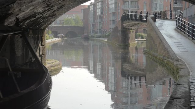 Narrow boat on the New Main Line canal from Wolverhampton, part of the Birmingham Canal Navigations.