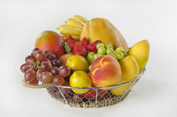 Bowl with a variety of colorful tropical fruits