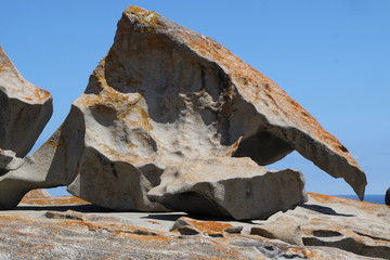 sky and mountain rock on the ocean