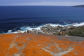 sky and mountain rock on the ocean
