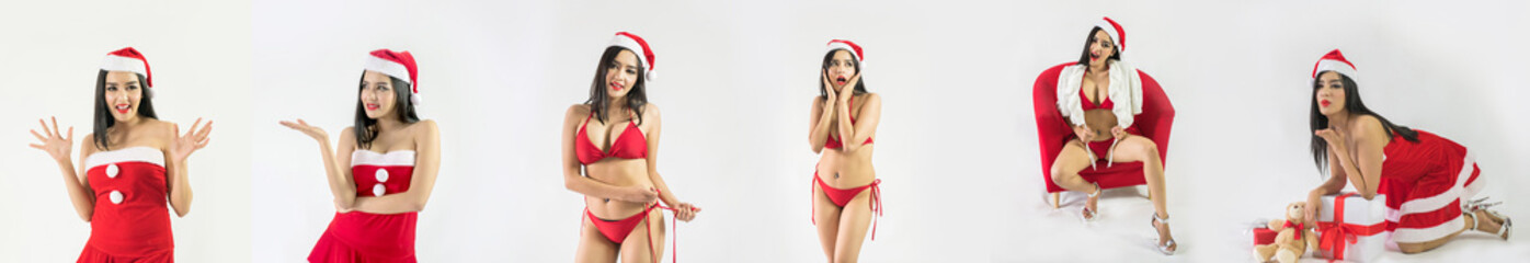 Beautiful happy woman in sexy Santa Claus clothes.