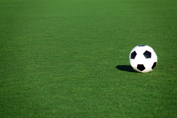 Football on a green field
