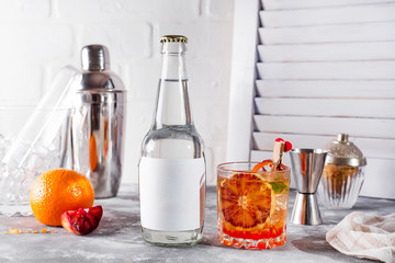 Fresh cocktail with orange and lemon on white wooden background ,