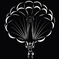 A man on a parachute, black background