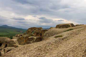 Fototapeta premium Old cave city Uplistsikhe in Caucasus mountains, Georgia