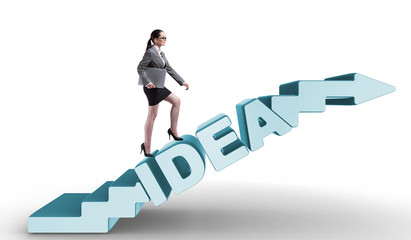 Concept of idea with businesswoman climbing steps stairs