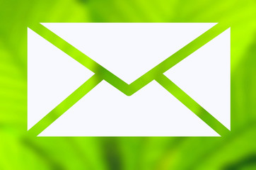Envelope with green nature background