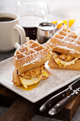 Waffle, fried egg and fish sandwich