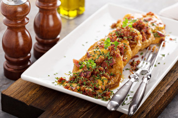 Fried green tomatoes with cheese sauce