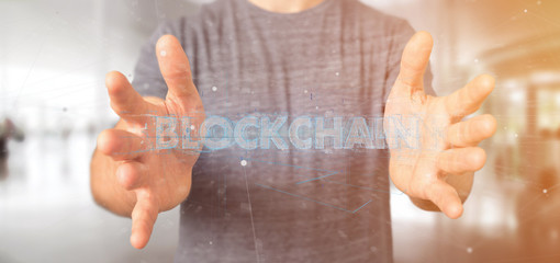 Man holding a Blockchain title isolated on a background