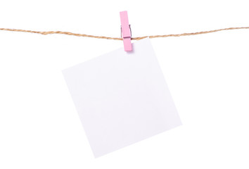 Sheet for notes clothespins rope on white background isolation