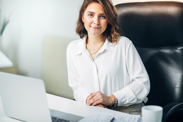 Young woman in office