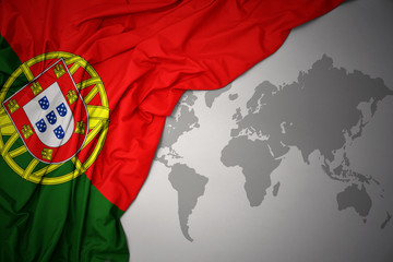 Fototapeta premium waving national flag of portugal.